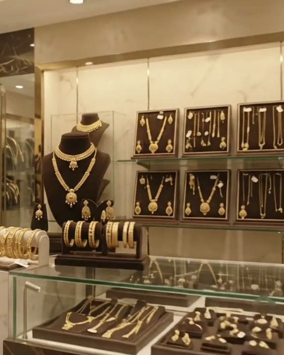 Gold necklaces displayed in the showroom